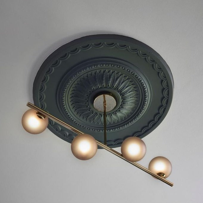 close up of black victorian ceiling rose