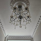 victorian dentil plaster coving shown with chandelier in entrance hall