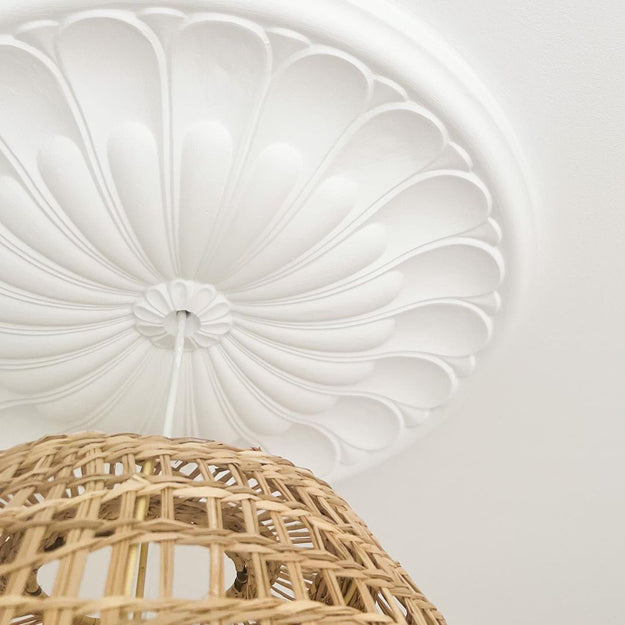 a photo of victorian floral ceiling rose with detailed basket lighting fixture.