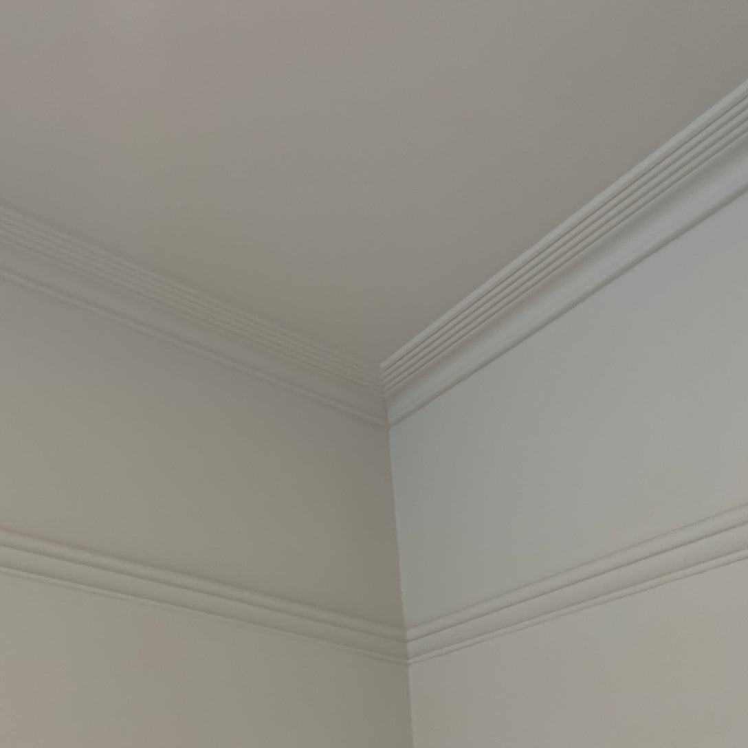 art deco plaster coving shown in white room