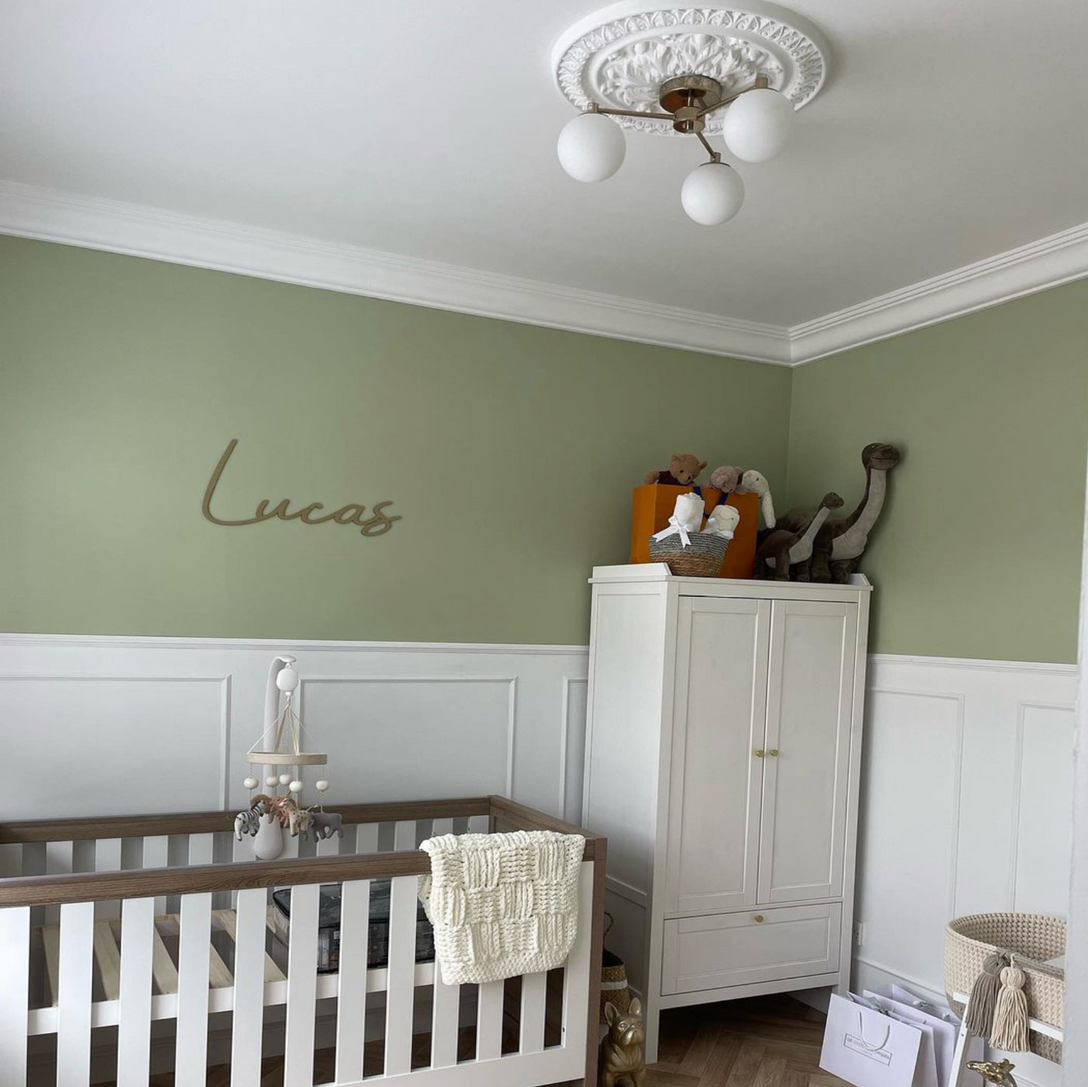 ornate victorian plaster ceiling rose in childs bedroom