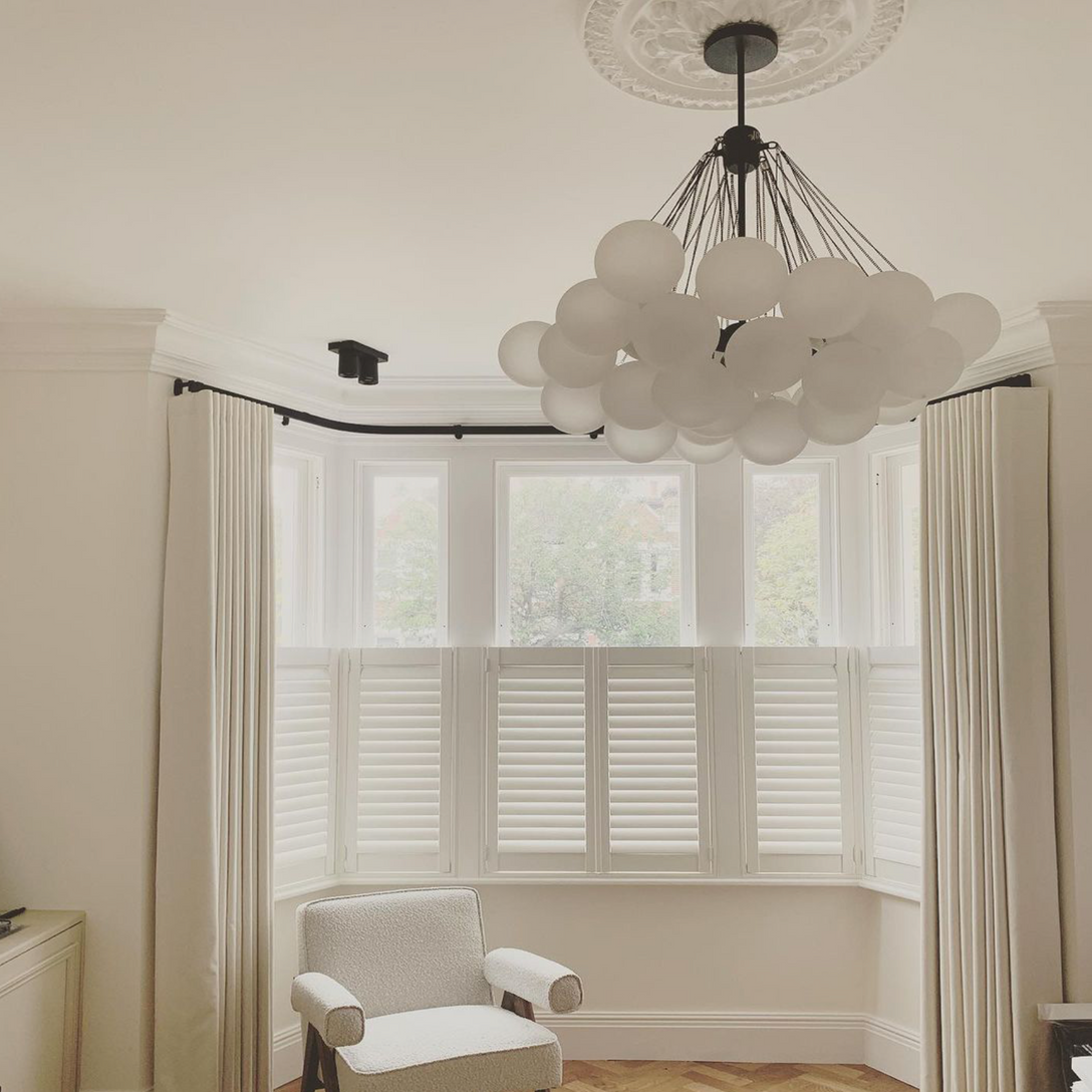 classic ornate plaster ceiling rose in modern light room