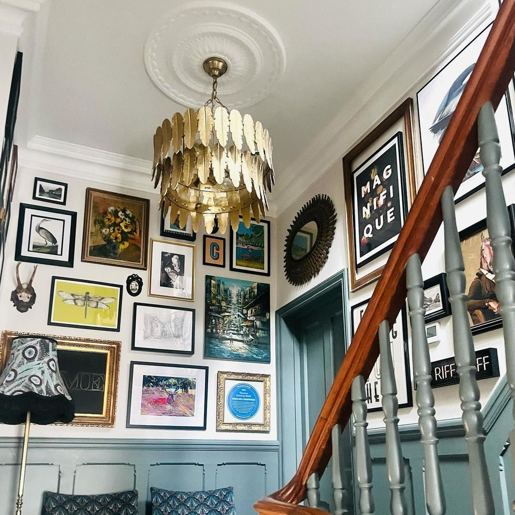 large sunflower ceiling rose in room full of photos