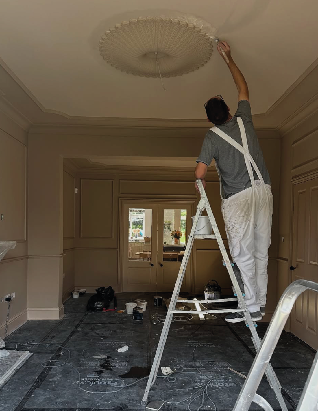 victorian plaster ceiling rose being installed