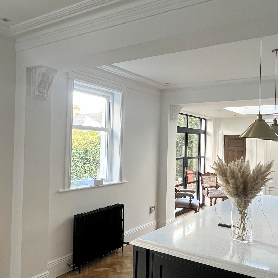 beautiful victorian corbels in modern bright kitchen