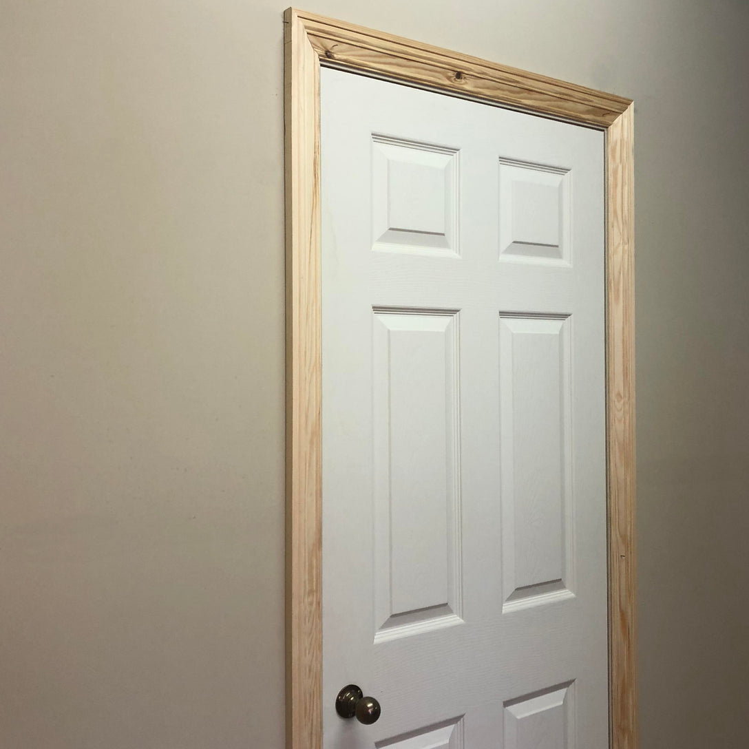 image shows a door finished with ogee timber victorian architrave