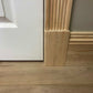 photo of fluted Victorian Timber Architrave meeting skirting board 91mm x 20mm