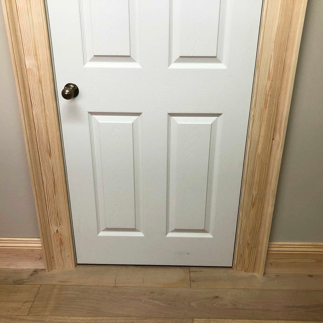 Large Victorian Architrave shown after instillation with skirting boards 135mm x 45mm