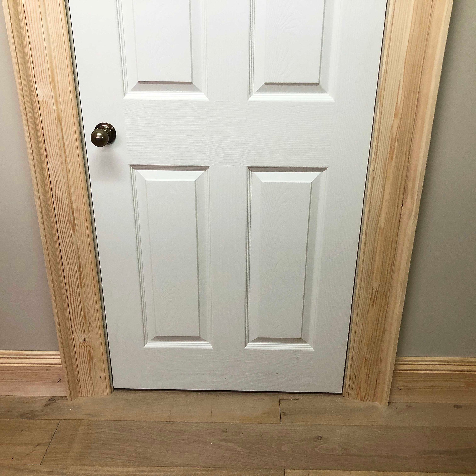 Large Victorian Architrave shown after instillation with skirting boards 135mm x 45mm