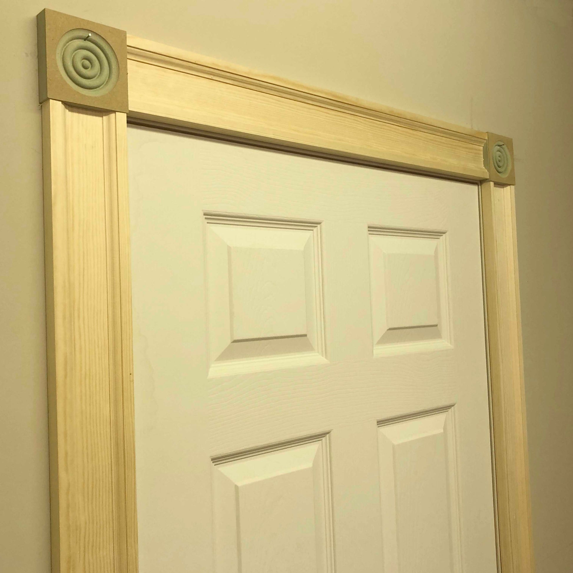 image of the top of a door fitted with vitorian timber architrave