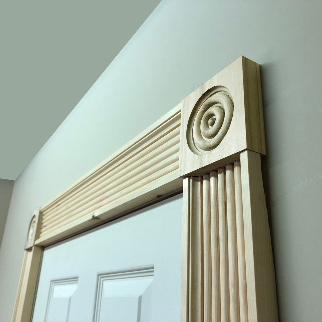Victorian Timber Corner Block shown fitted around a door 95mm x 95mm x20mm 