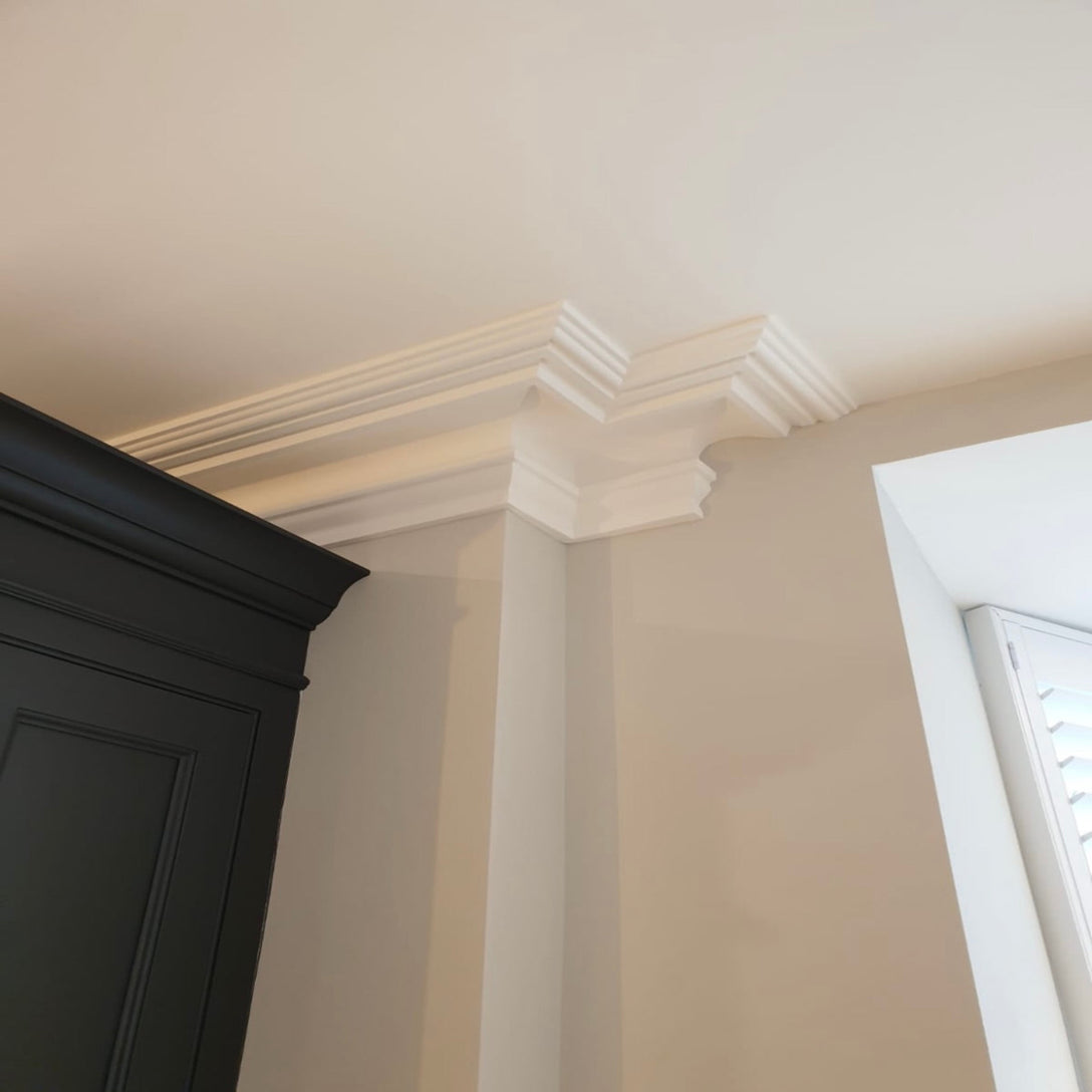 complex section of swan neck coving fitted