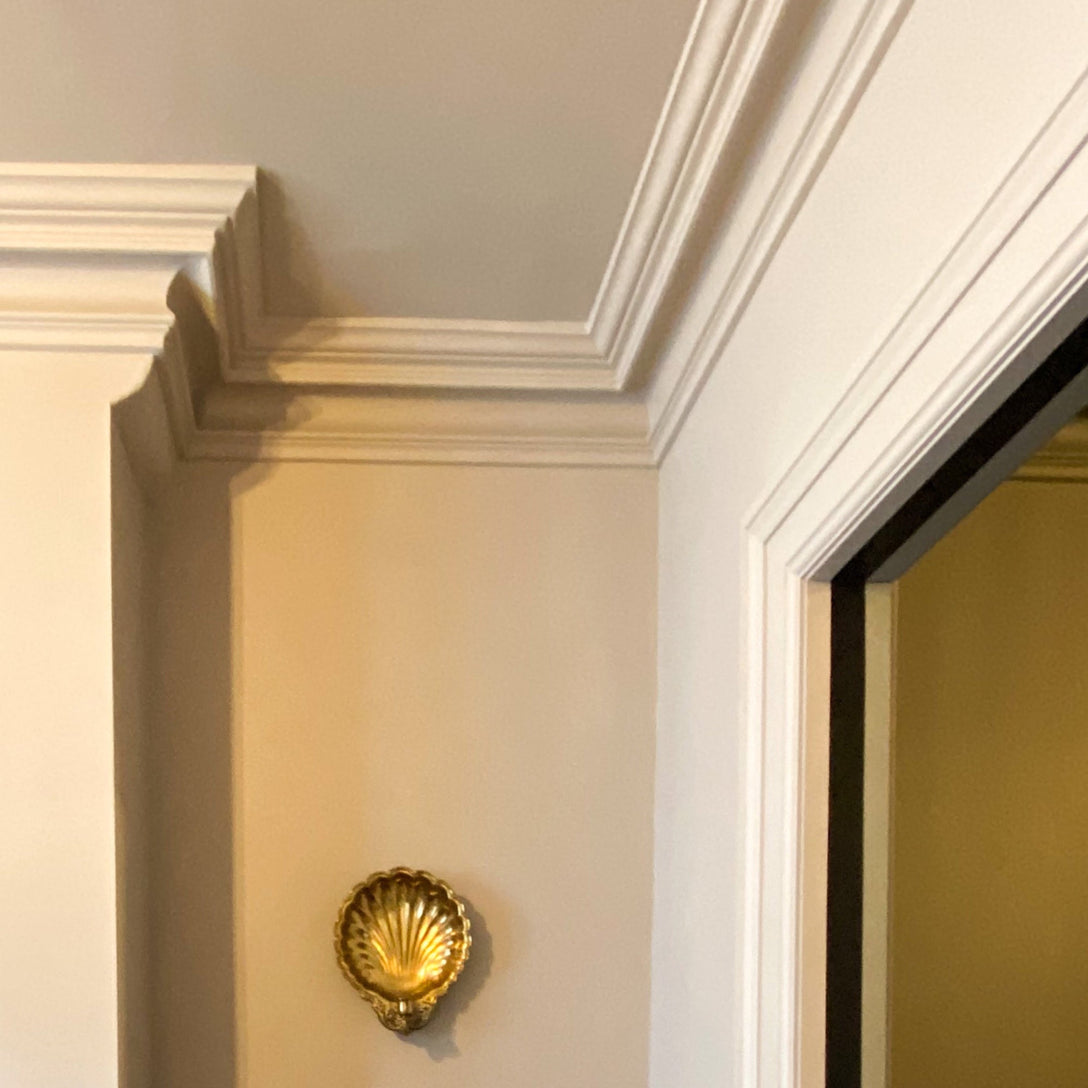 Victorian Swan Neck cornice in warm lighting