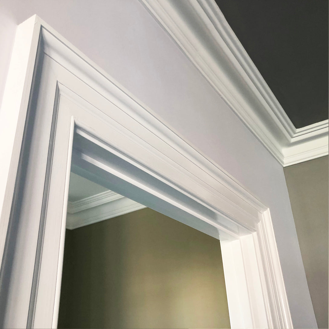 complex section of Traditional Victorian Plaster Coving shown above door way - 150MM