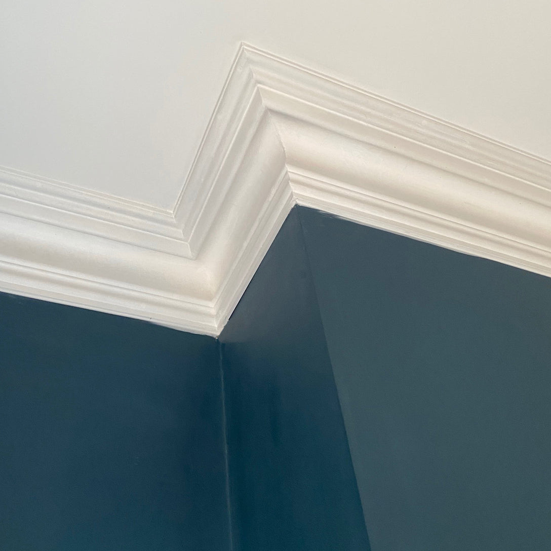 Traditional Victorian Paster Coving shown in a blue room 150MM