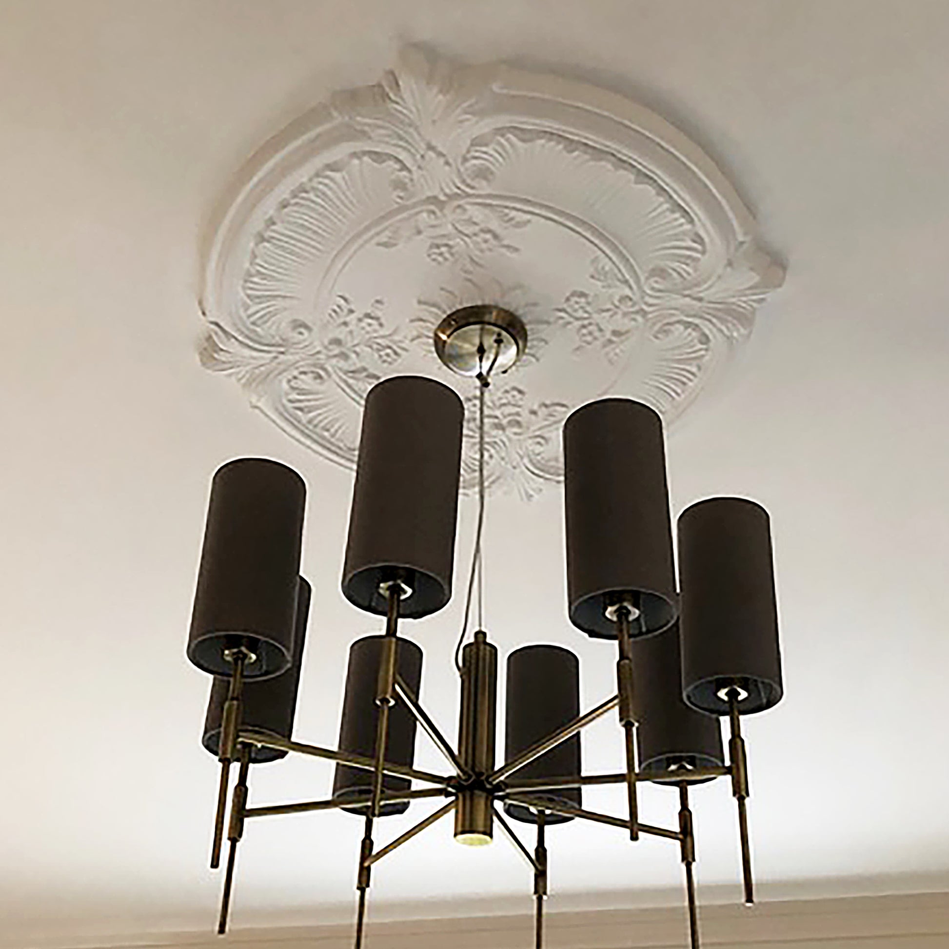 French Style Plaster Ceiling Rose in naturally lit room