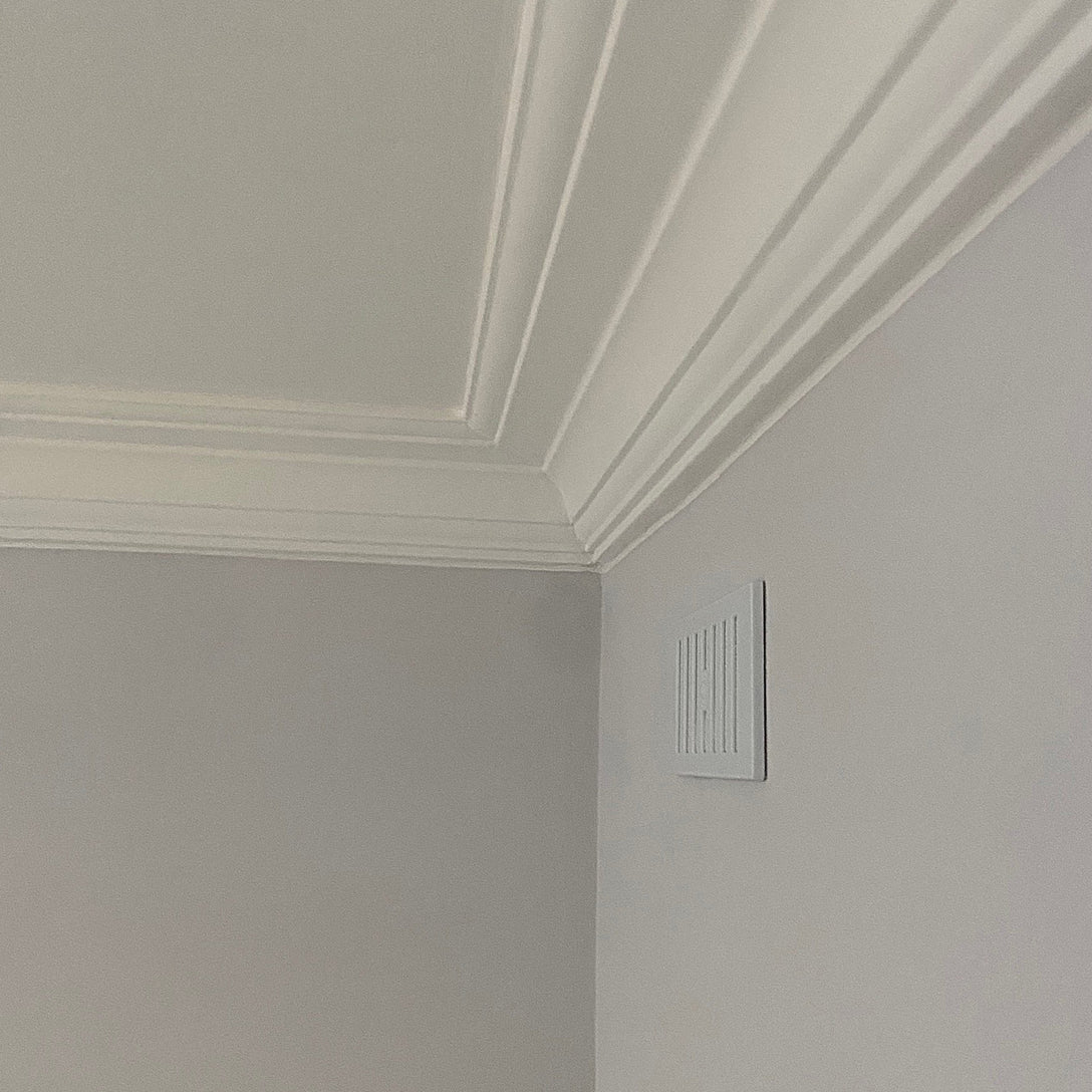 victorian Plaster cornice shown in a white room110mm Drop 