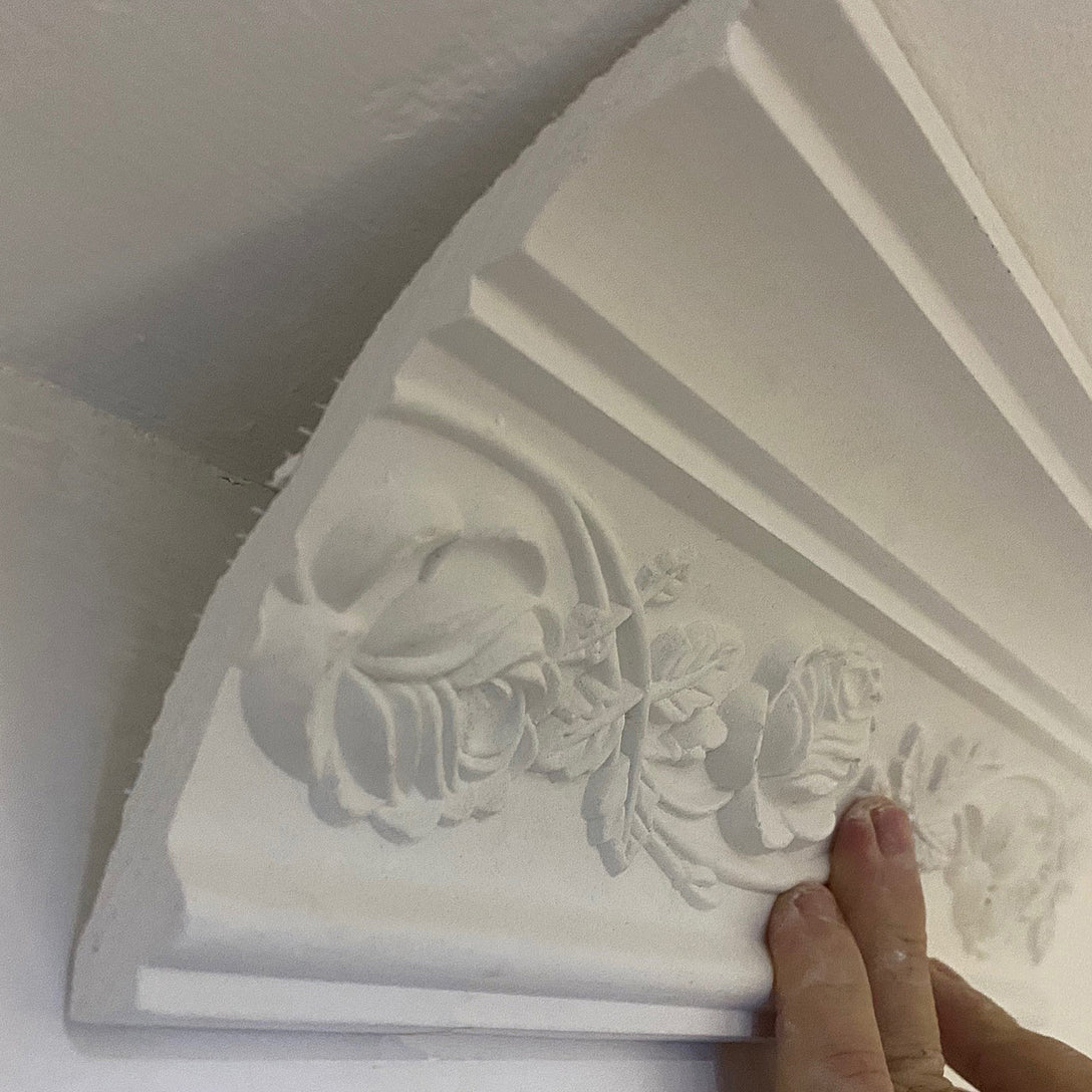 close up image of floral rose Plaster coving - 120mm