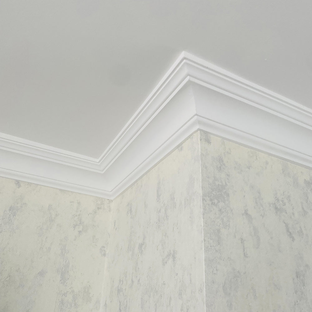 section of classic Plaster Coving shown with stone effect wallpaper - 90mm Drop