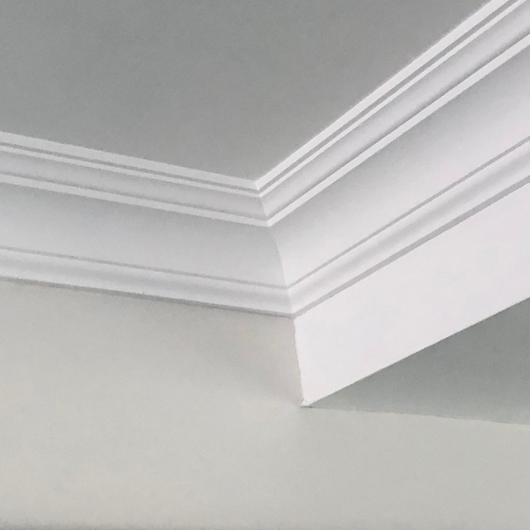Plaster Coving Classic shown in a white room 90mm Drop