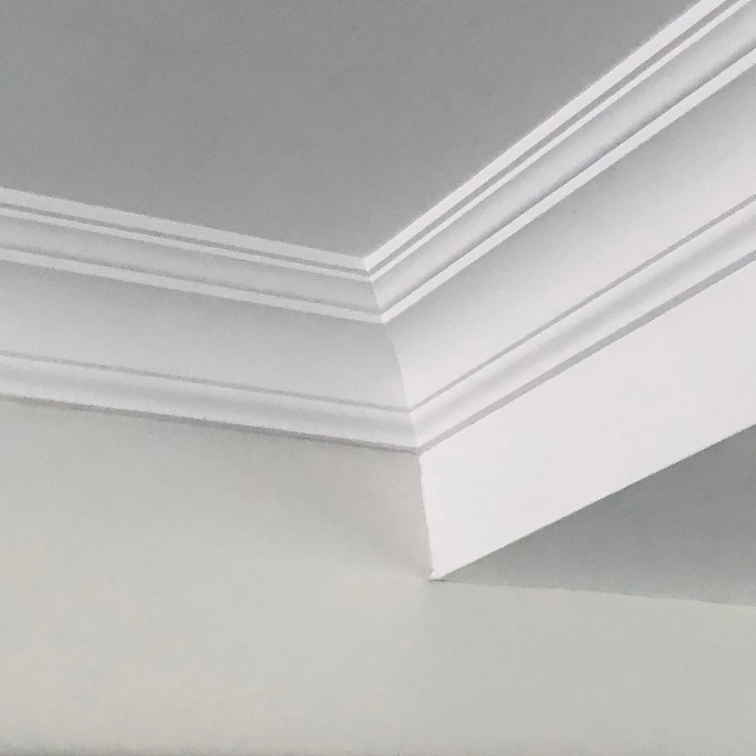 Plaster Coving Classic shown in a white room 90mm Drop