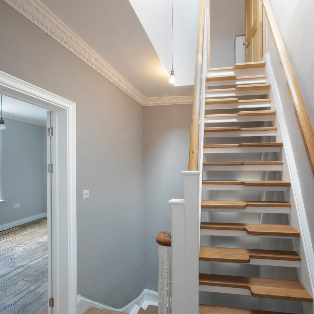 Egg & Dart coving in hallway near stairs