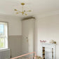 example of swan neck plaster coving fitted in neutral kids room 