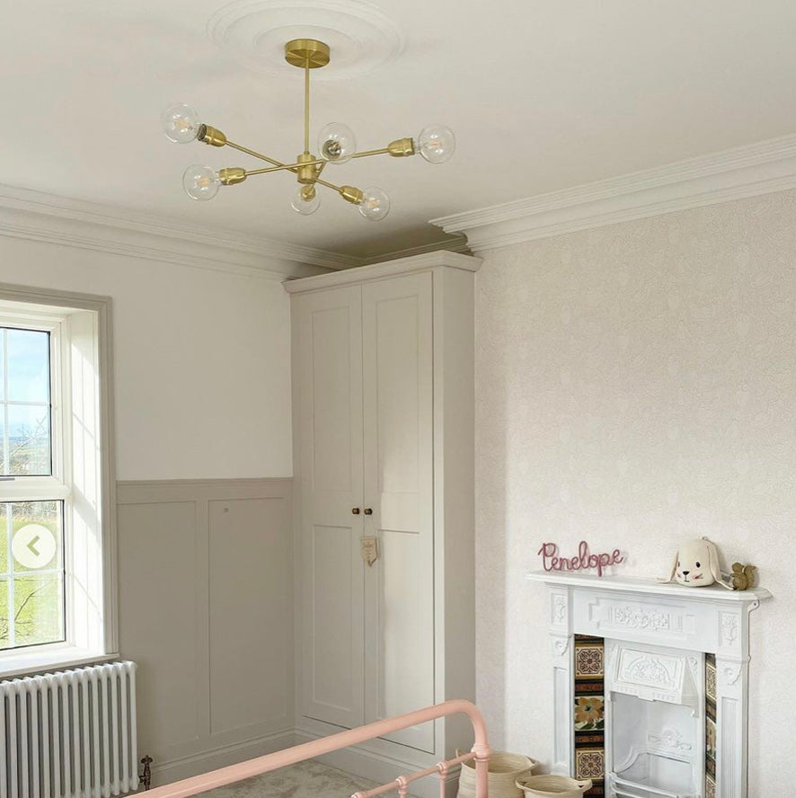 example of swan neck plaster coving fitted in neutral kids room