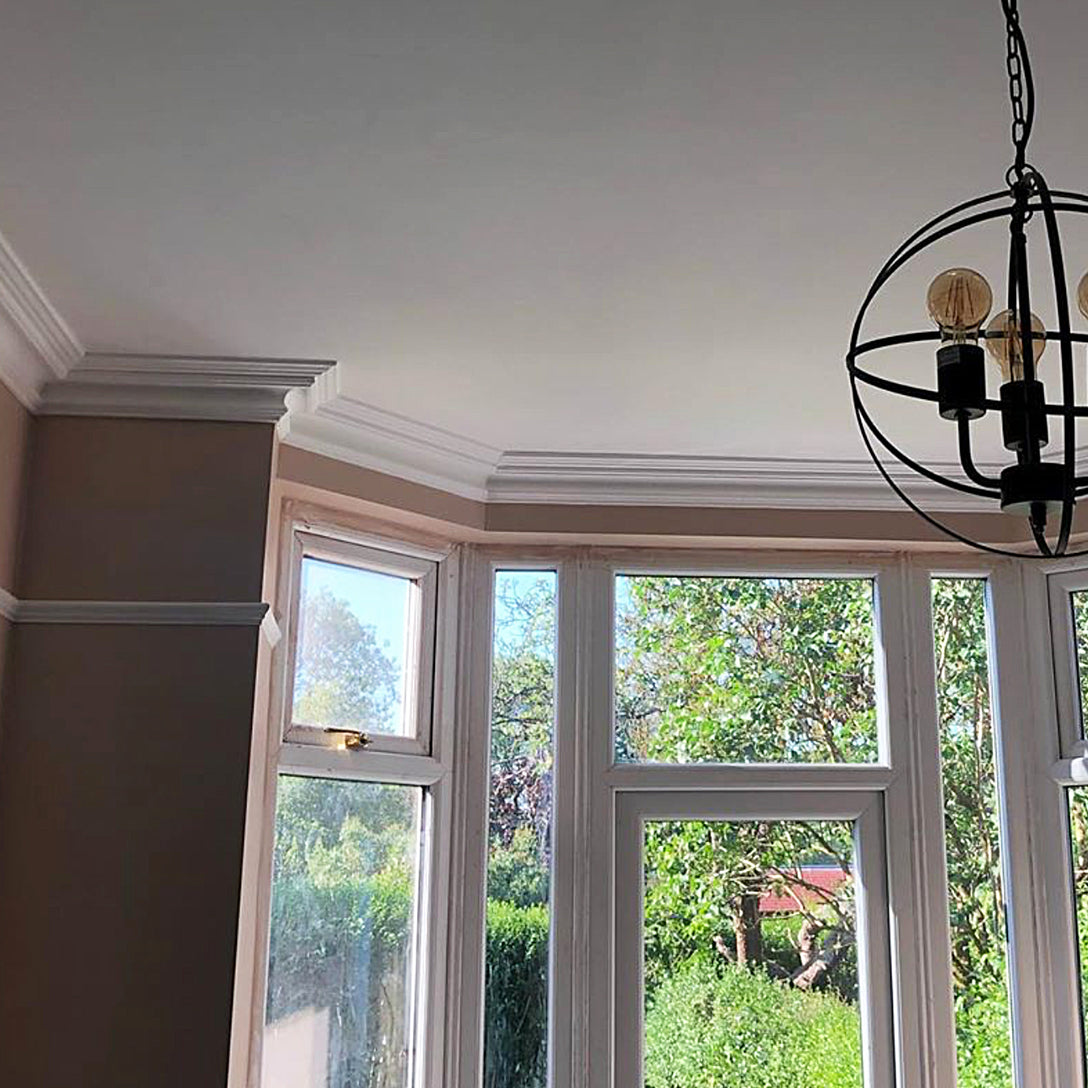 100mm swan neck plaster cornice fitted around bay window