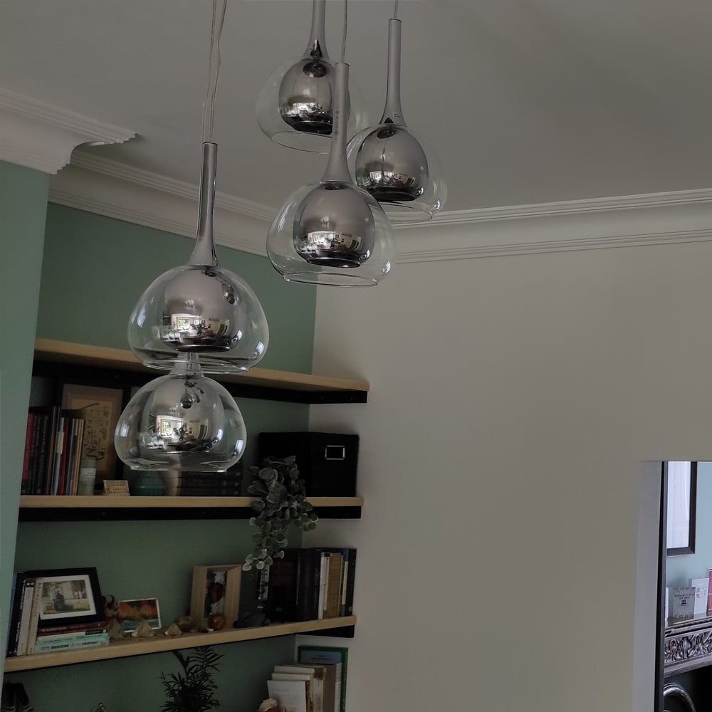 classic plaster cornice shown with chandelier