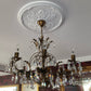acanthus plaster ceiling rose shown with chandelier 