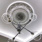 photo of victorian style plaster ceiling rose fitted with art deco chandelier 
