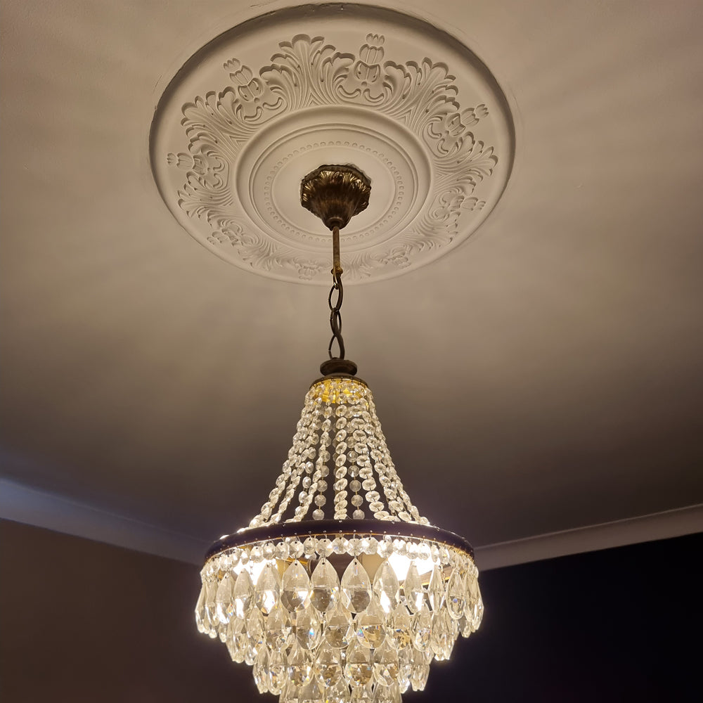 500mm vitorian plaster ceiling rose shown fitted with chandelier