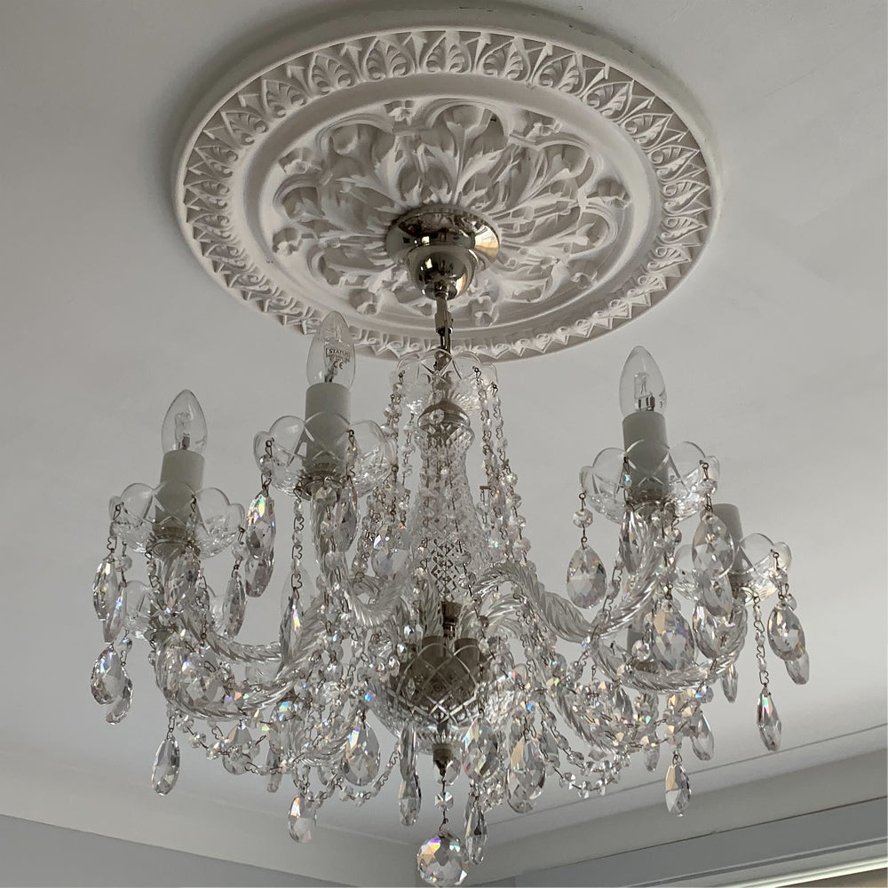 Ornate Victorian Plaster Ceiling Rose in modern room