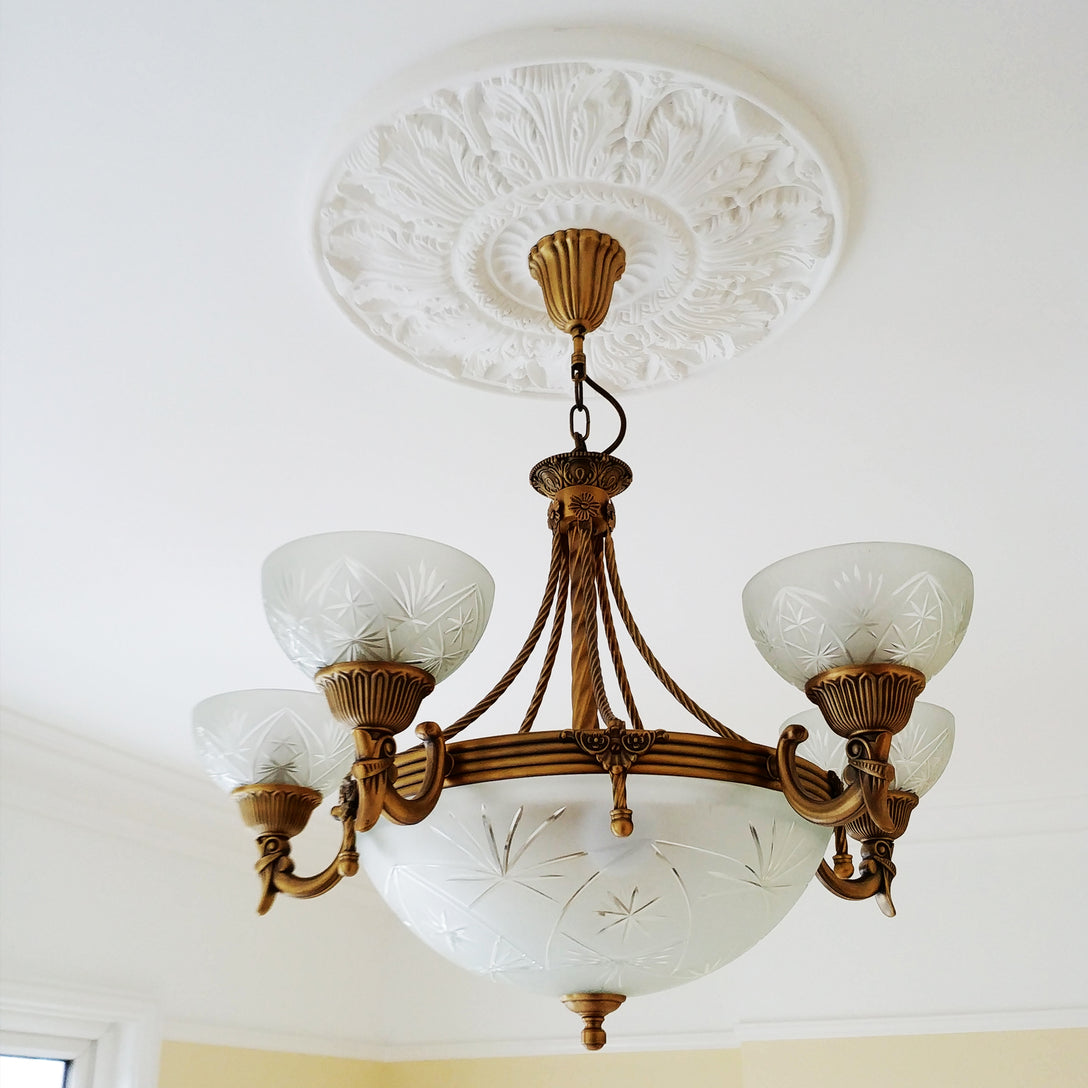 example of Victorian Decorated Plaster Ceiling Rose with vintage chandelier