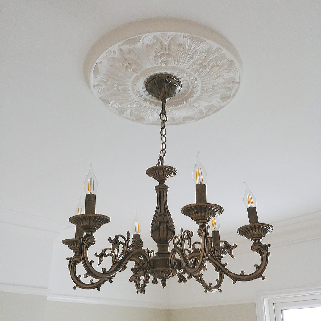 example of Victorian Decorated Plaster Ceiling Rose shown with chandelier fitted
