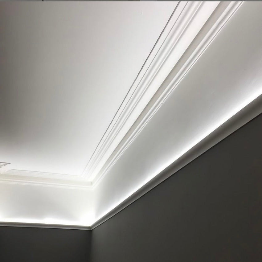 100m swan neck plaster coving shown in green room