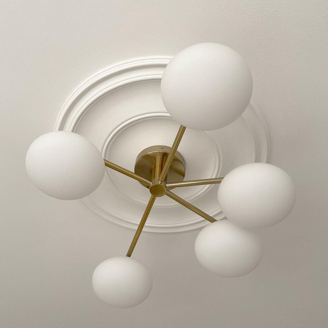 Plain Spun Plaster Ceiling Rose with modern light fitting