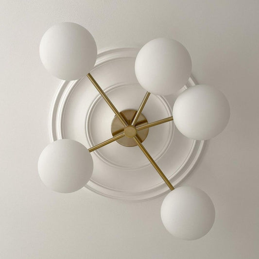 Plain Spun Plaster Ceiling Rose with simplistic light fitting