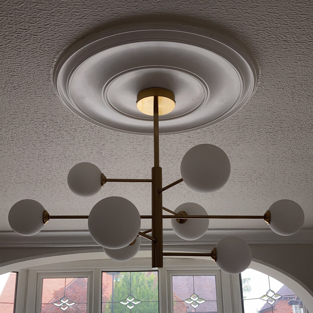 Plain Spun Plaster Ceiling Rose in natural light