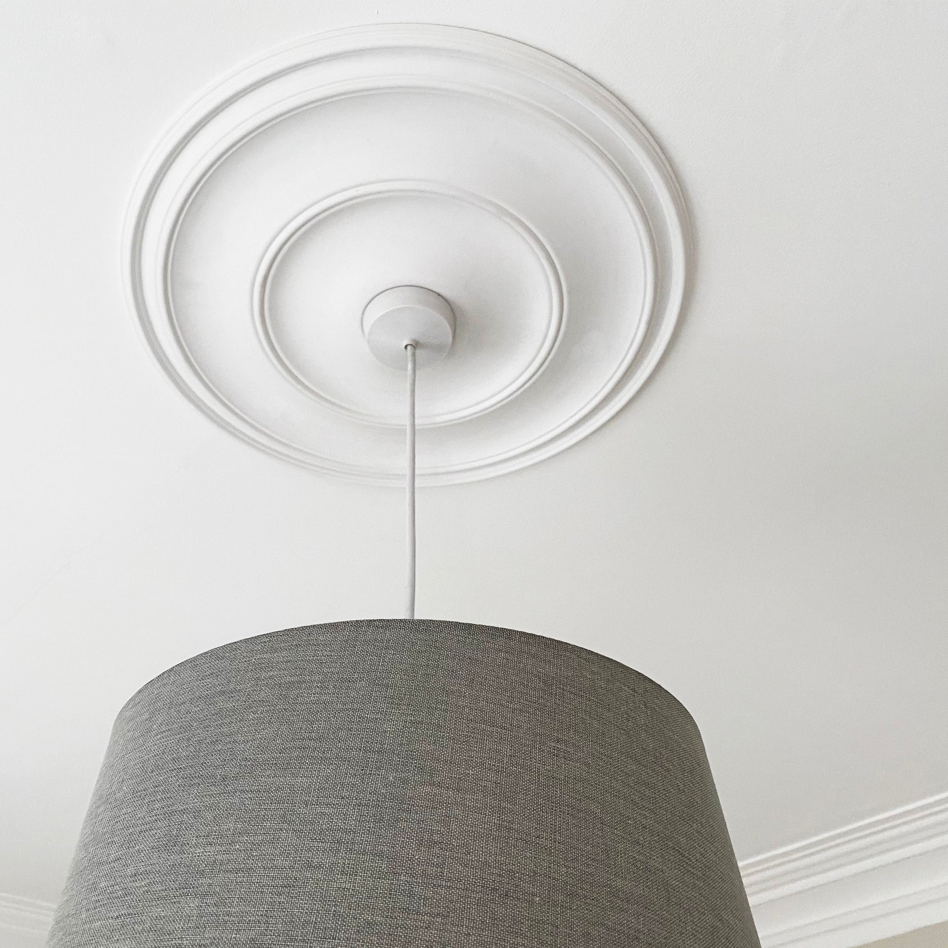 Plain Spun Plaster Ceiling Rose from beneath
