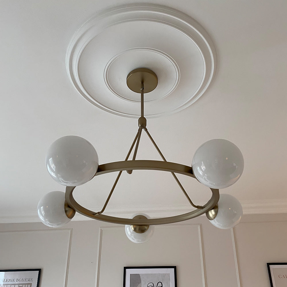 Plain Spun Plaster Ceiling Rose in natural lighting