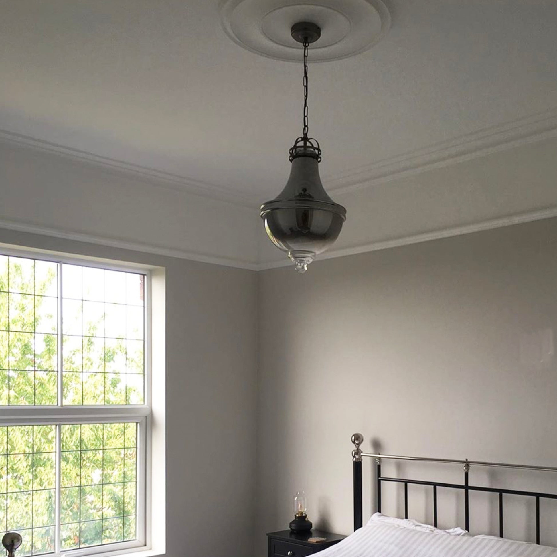 Plain Spun Plaster Ceiling Rose in furnished bedroom