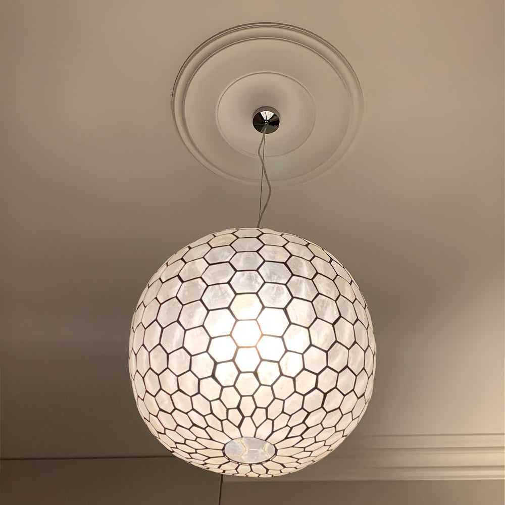 Plain Spun Plaster Ceiling Rose with bright lighting