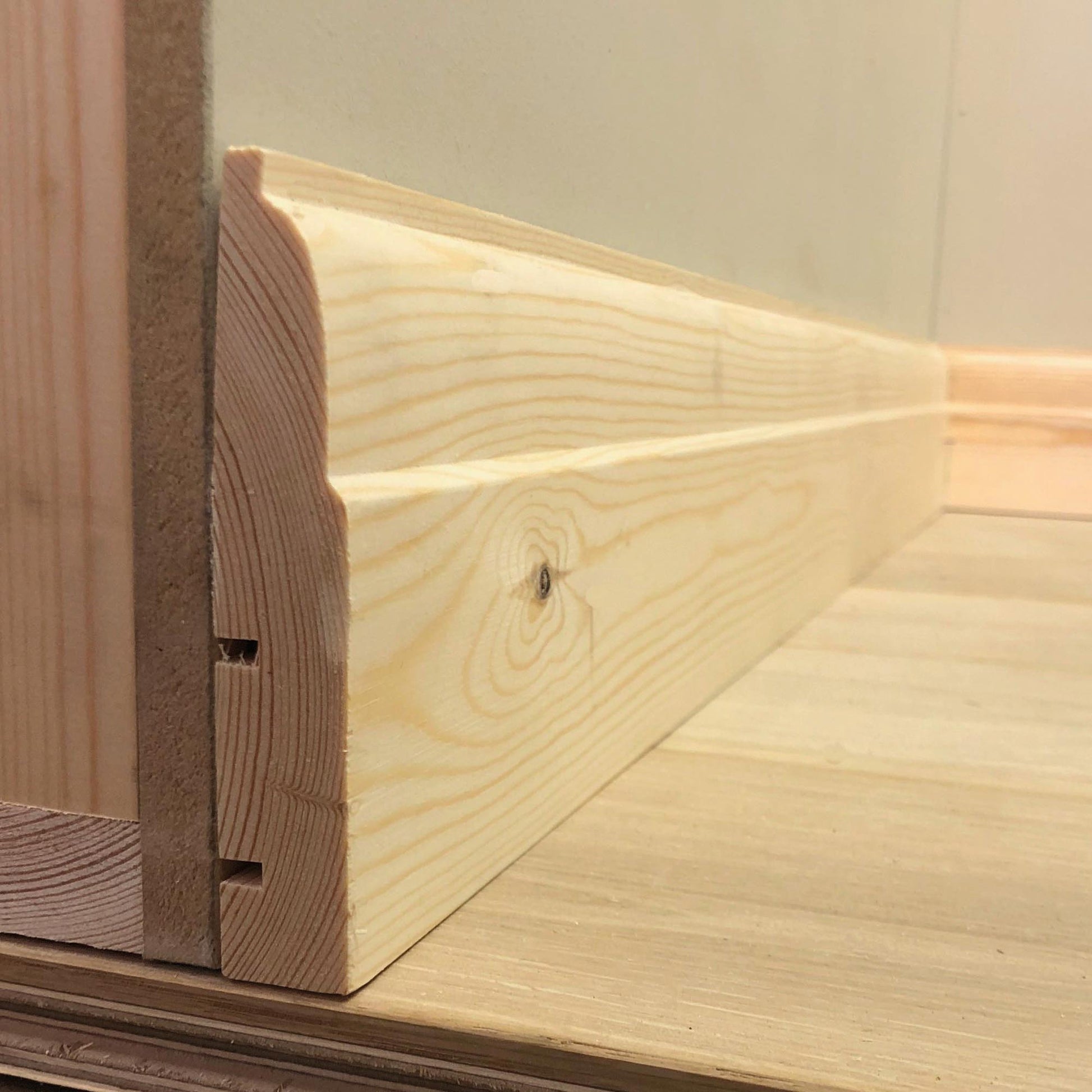 technical photo showing side view of 5 inch Classic Timber Skirting Board - 117mm x 21mm