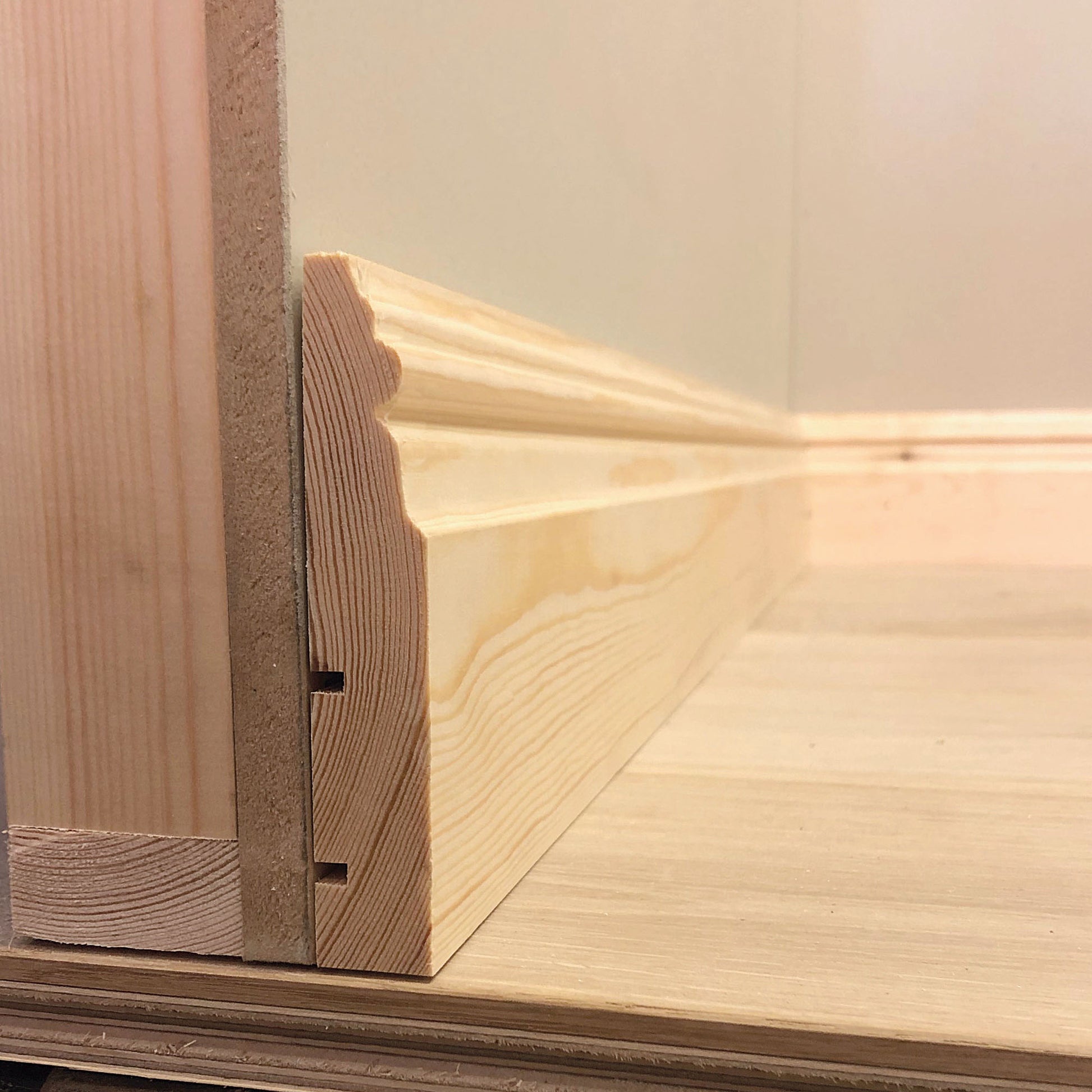technical image showing side view of Medium Victorian Timber Skirting Board - 117mm x 21mm