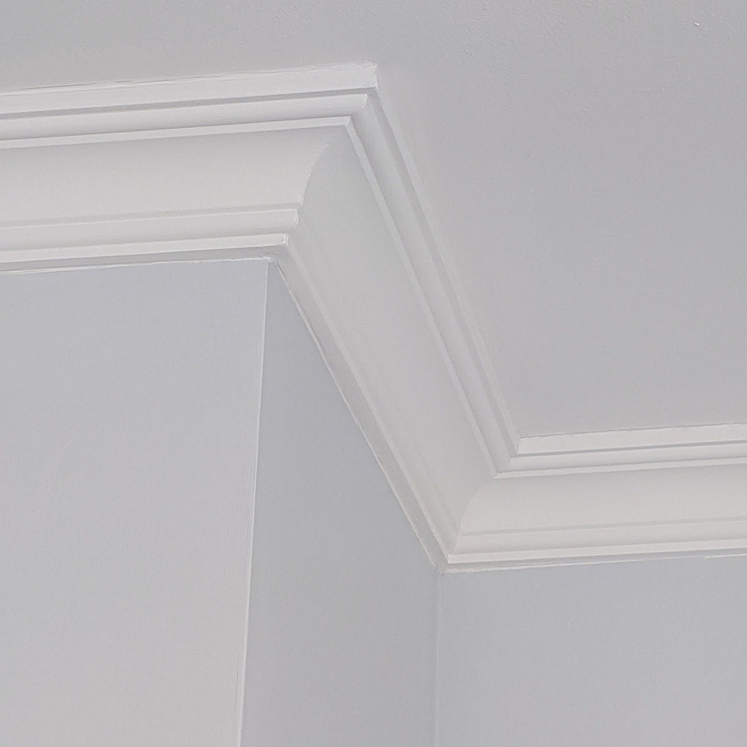 Small coving in well-lit room