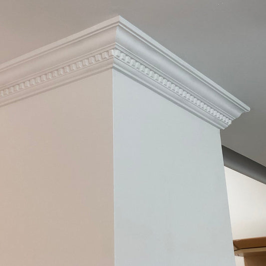 Dentil coving in large, light room