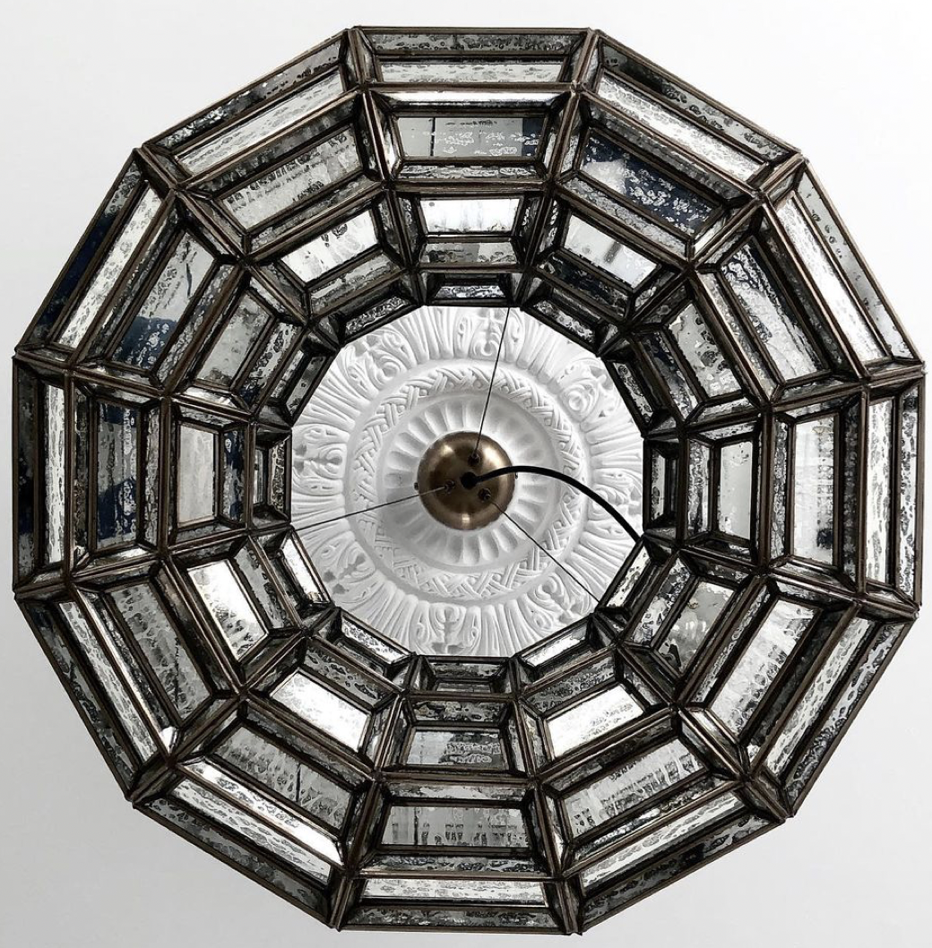 crown and acanthus plaster ceiling rose shown from below