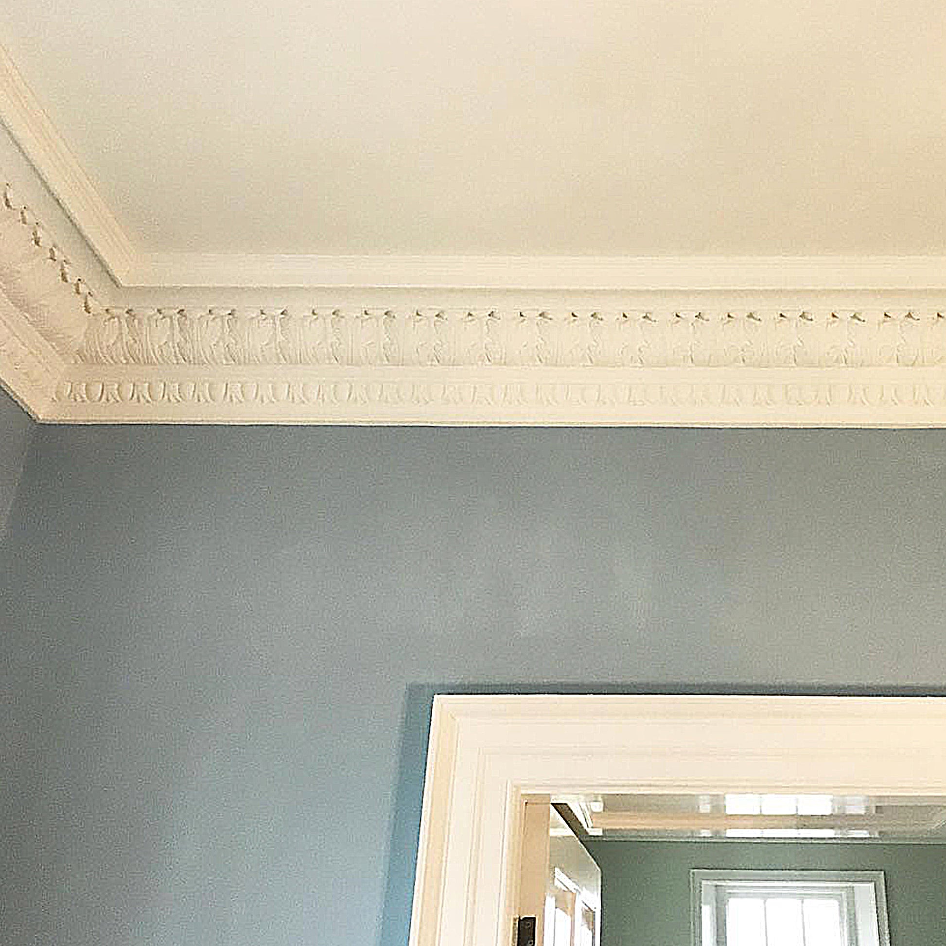Plaster Coving Victorian shown in blue living room  235mm Drop